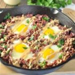 This Corned Beef Hash Breakfast Skillet is the perfect way to start to every day. A balanced breakfast of corned beef, cauliflower hash, and pastured eggs, all perfectly seasoned.