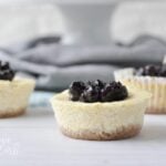 Mini Keto Blueberry Cheesecakes. All of the amazing flavor of a low carb cheesecake recipe, in a mini, bite size.