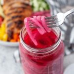 Mason jar full of pickled red onions