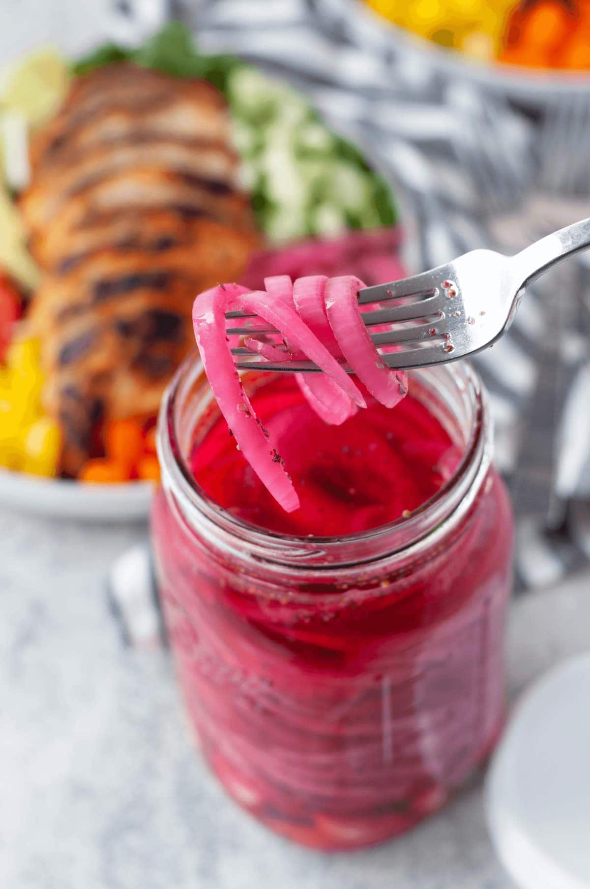 Mason jar full of pickled red onions