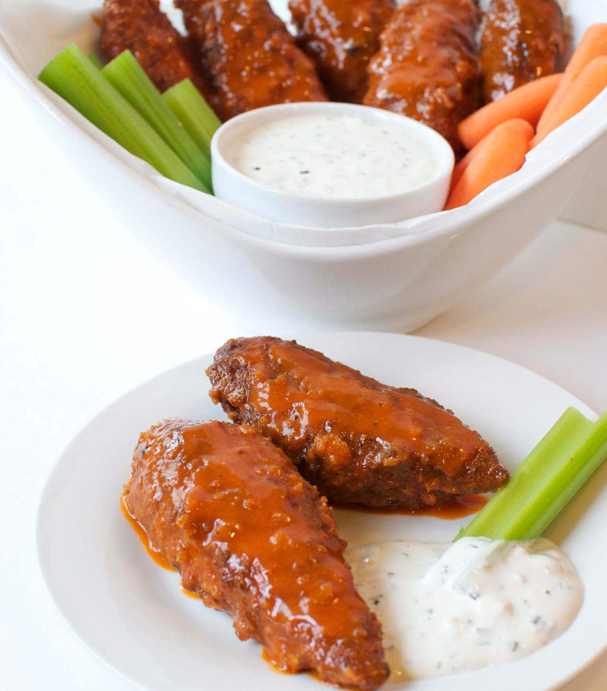 2 breaded chicken tenders, tossed in buffalo sauce and served with ranch, carrots and celery