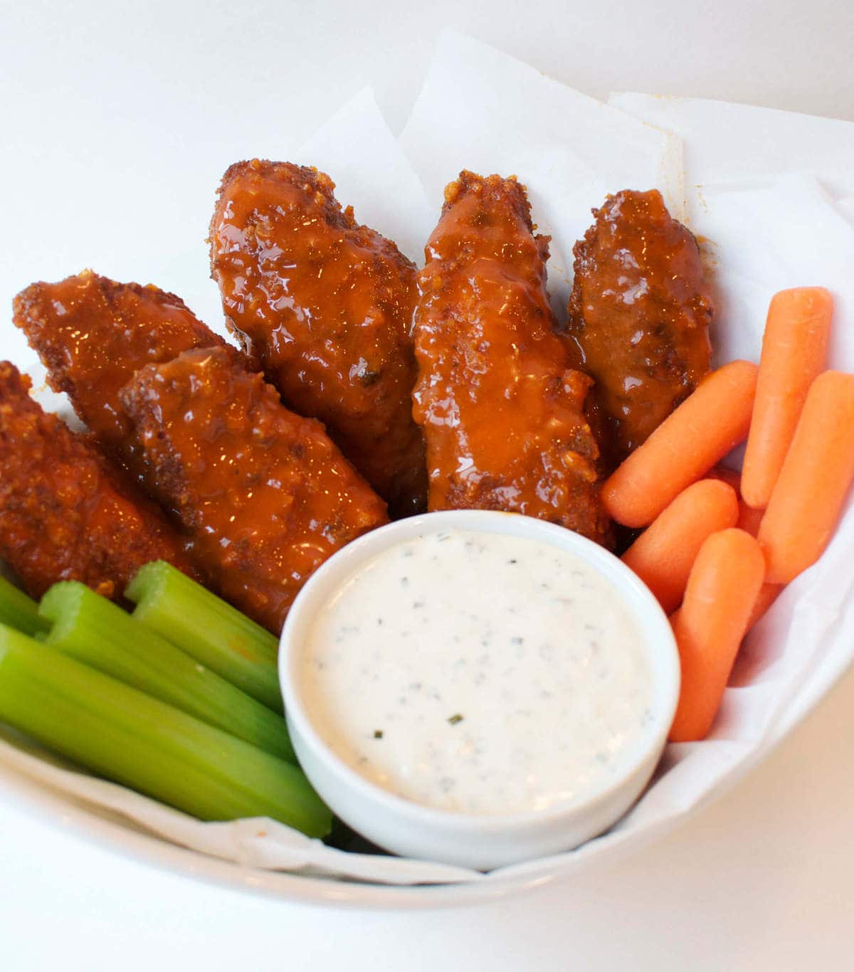 breaded chicken tenders, tossed in buffalo sauce and served with ranch, carrots and celery