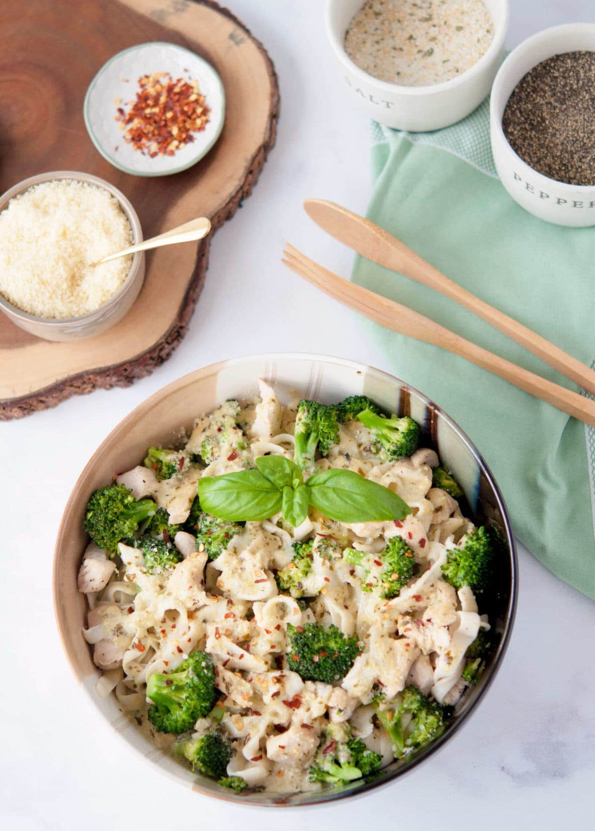 Chicken and Broccoli Keto Fettuccine Alfredo with Pesto is comfort food at its finest. If you've been missing pasta on your low carb diet, look no further.