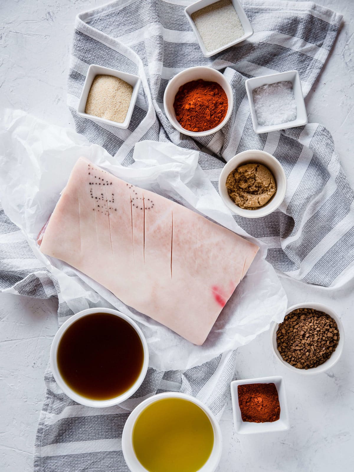 ingredients for pan-seared crispy pork belly - pork, olive oil, barbecue dry rub