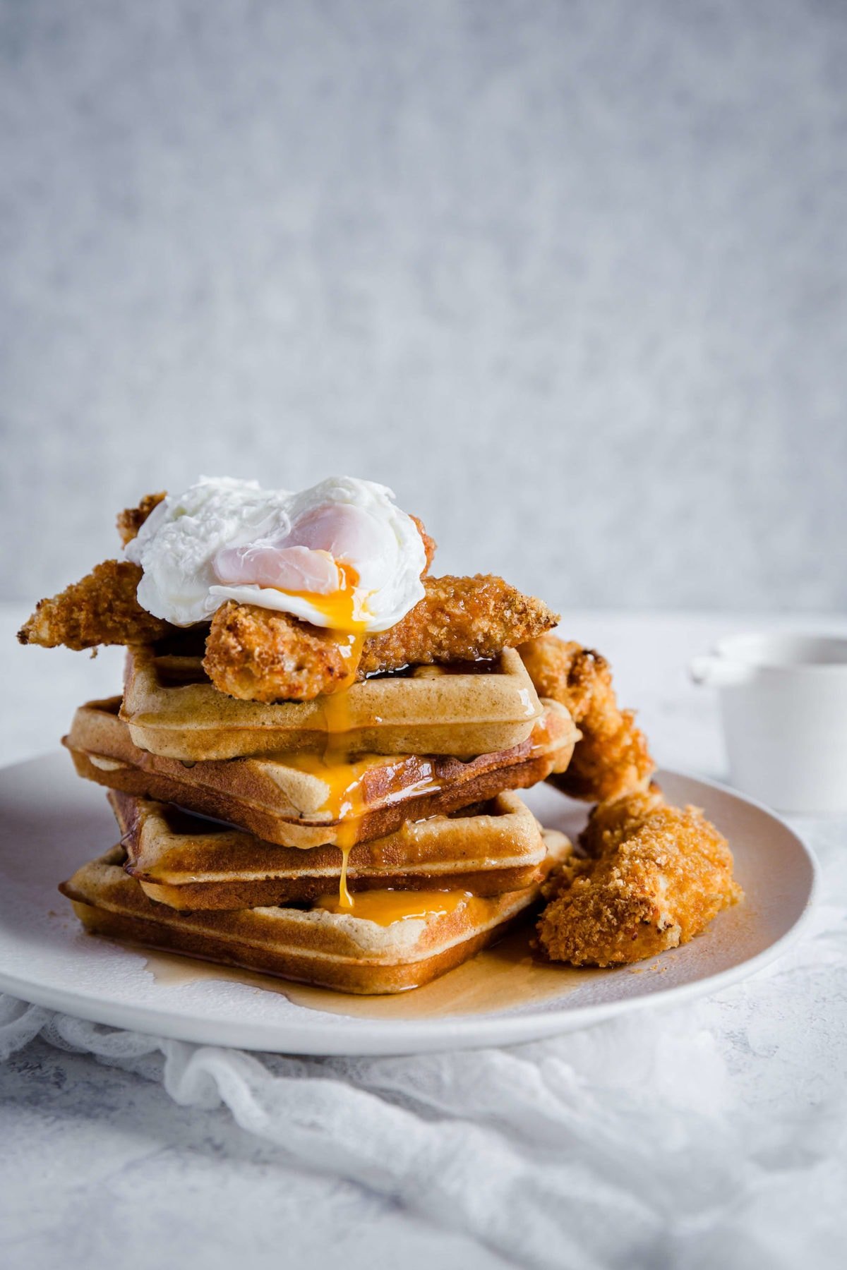 This Keto Chicken and Waffles recipe is combining the ultimate soul food with comfort food at its finest. This healthier version may be low carb, and gluten free, but it is packed with flavor.