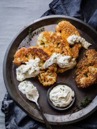These Keto Chicken Fried Cauliflower Steaks have all the crispy and delicious flavors of a traditional Country Fried Steak Recipe, but in a vegetarian keto recipe.