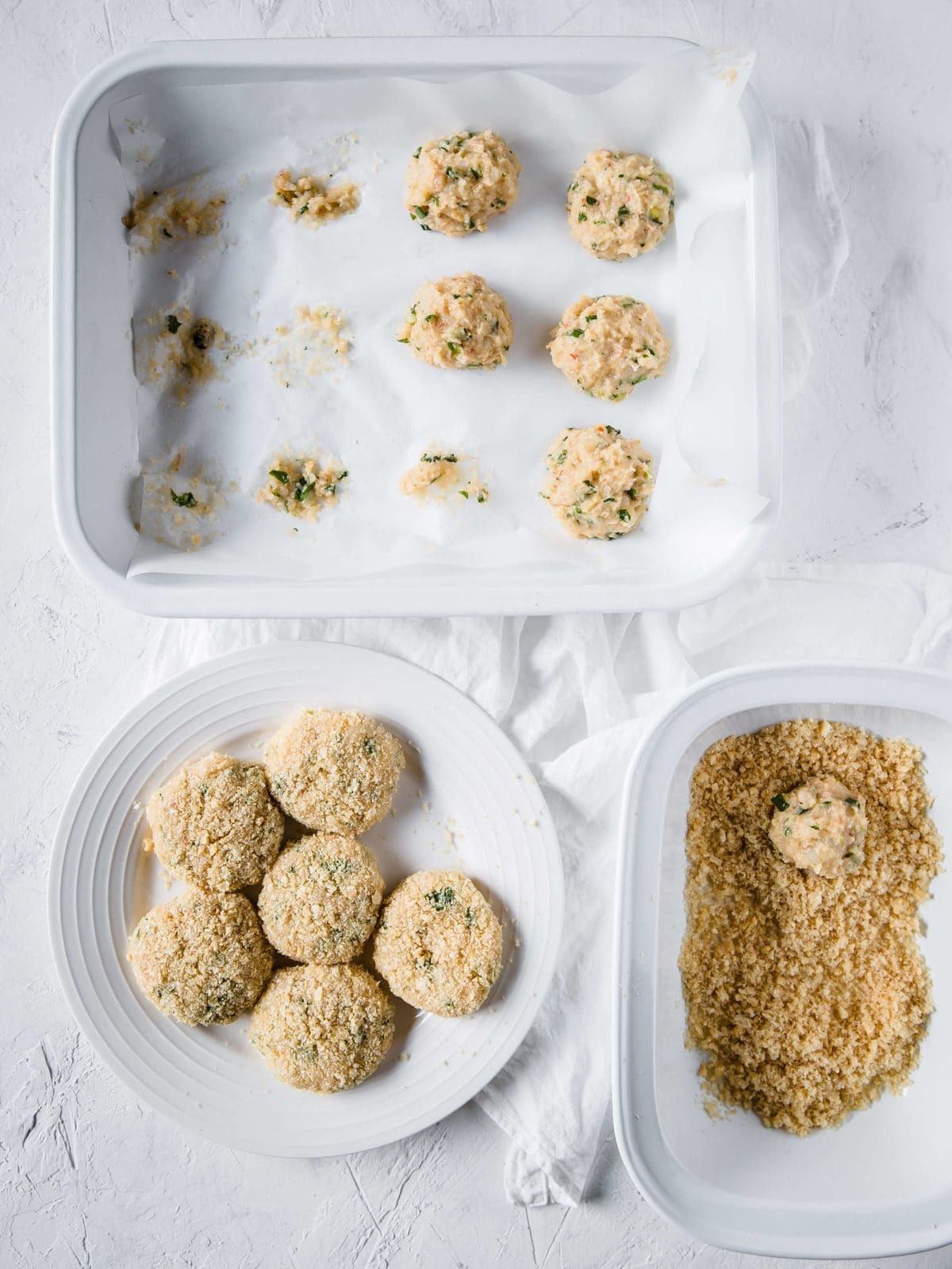 gluten free thai shrimp cakes being breaded and getting ready to be fried