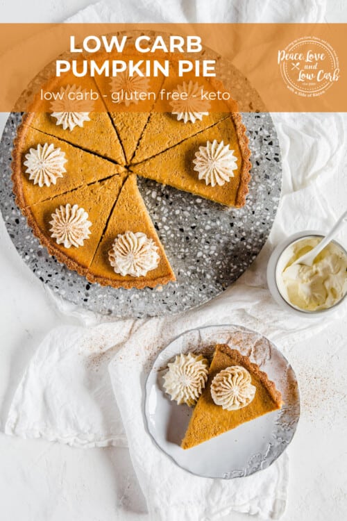 A fresh baked pumpkin pie, sliced and topped with whipped cream and pumpkin pie spice.