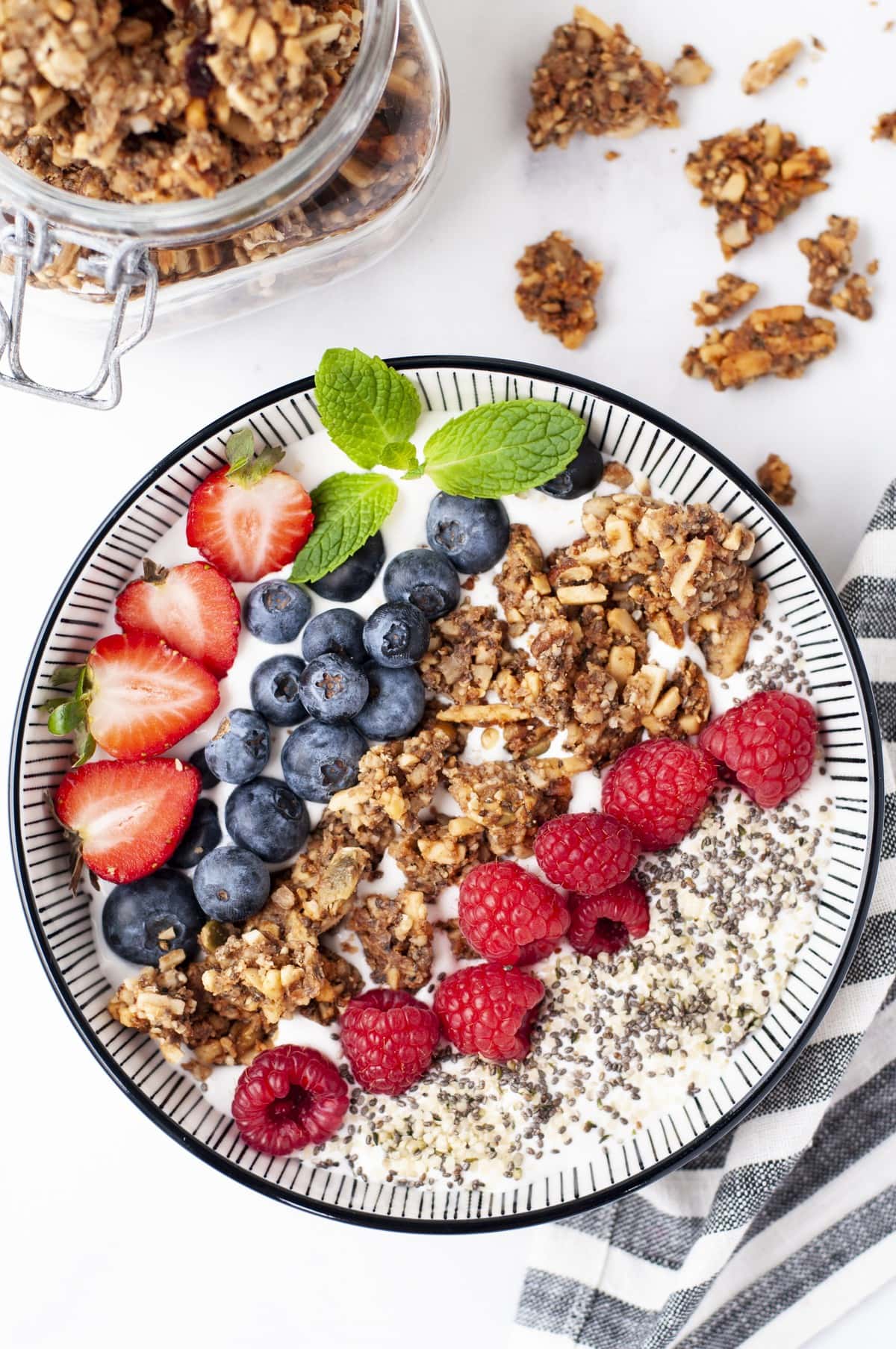 overhead shot of a yogurt granola parfait bowl