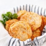 Basket of warm gluten free cheesy biscuits