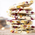 low carb white chocolate bark with cranberries and pistachios, piled high