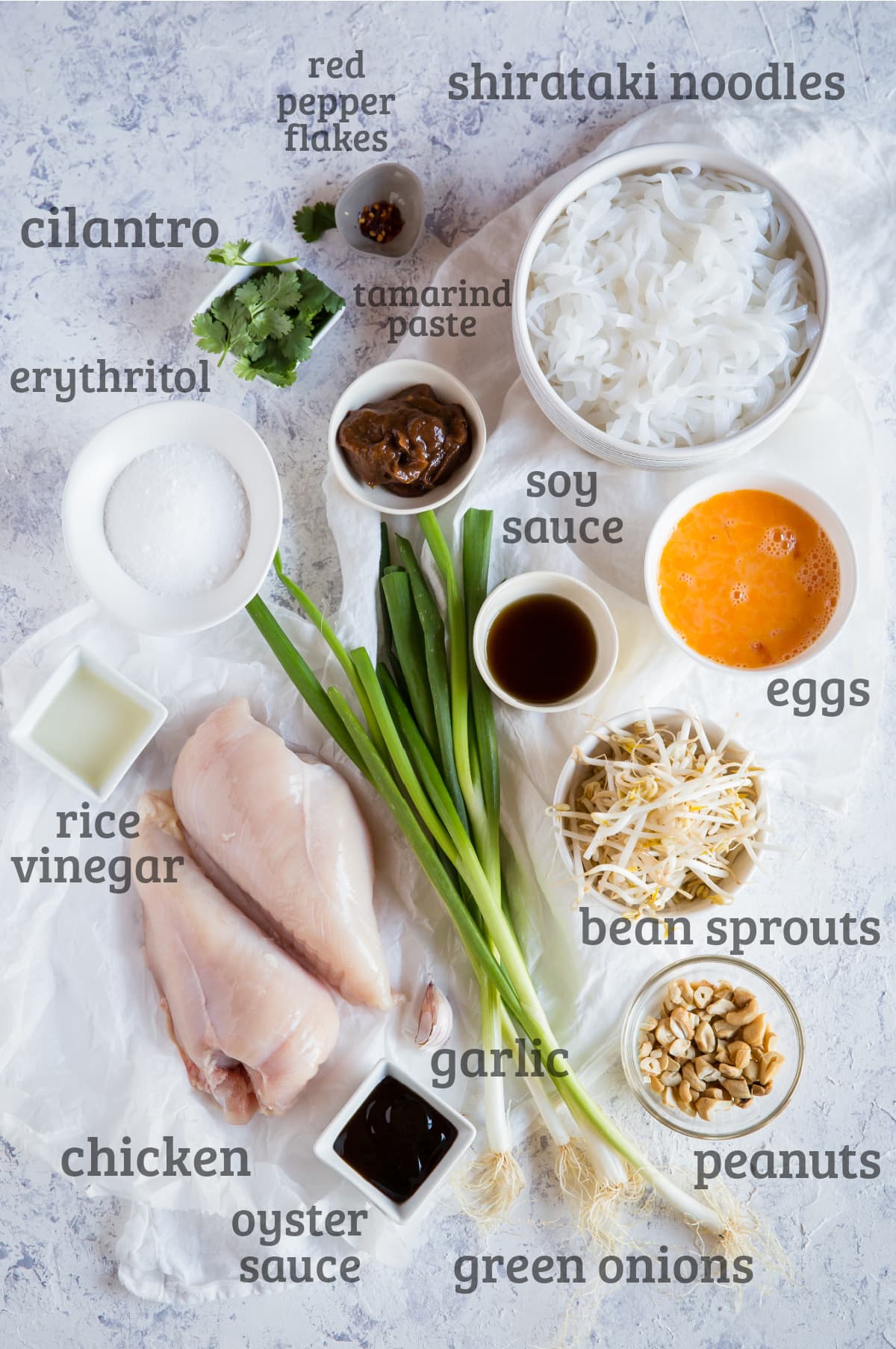 Ingredients for low carb Pad Thai - shirataki, chicken, bean sprouts, cilantro, lime, garlic, egg, oyster sauce