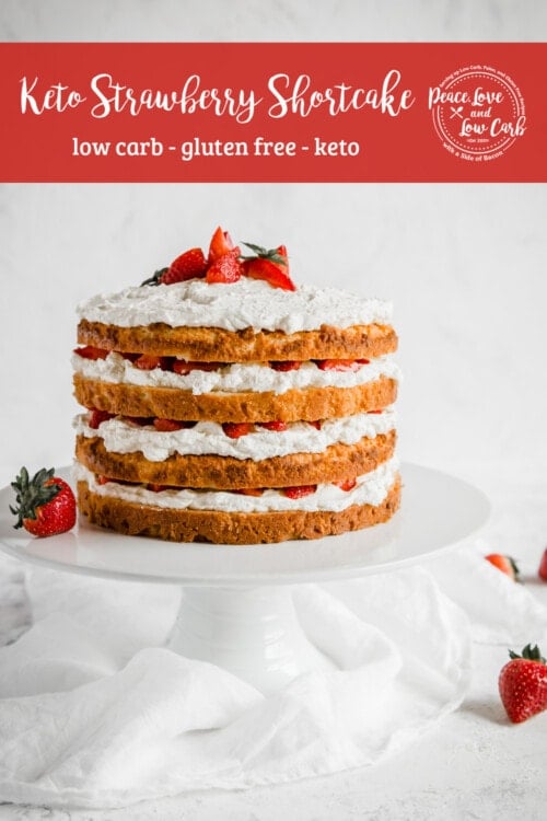 gluten free Strawberry shortcake, with layers of fresh cream and strawberries on a cake stand