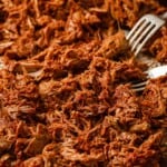 keto barbecue pulled pork, shredded and sauced on a sheet pan
