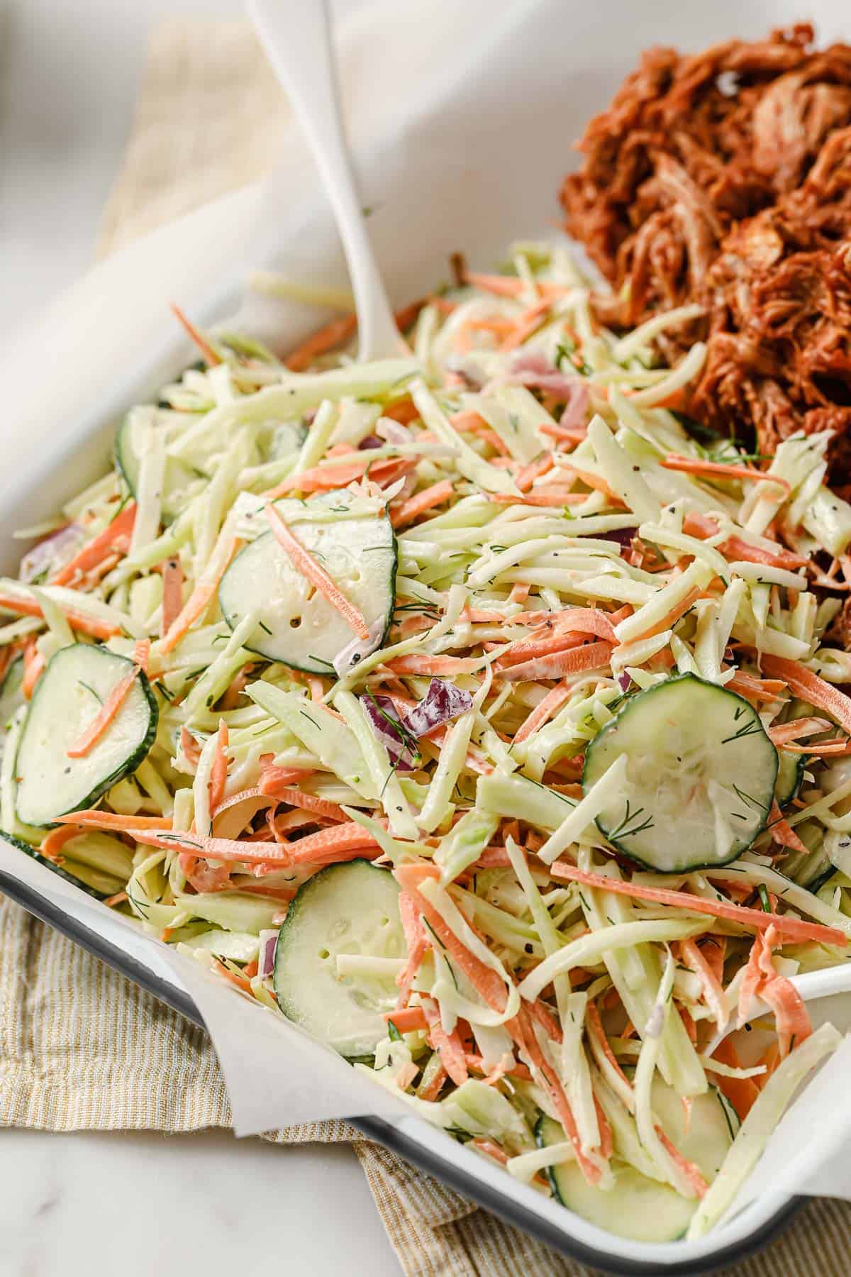 cooked and shredded pork butt, tossed with keto barbecue sauce, on a sheet pan