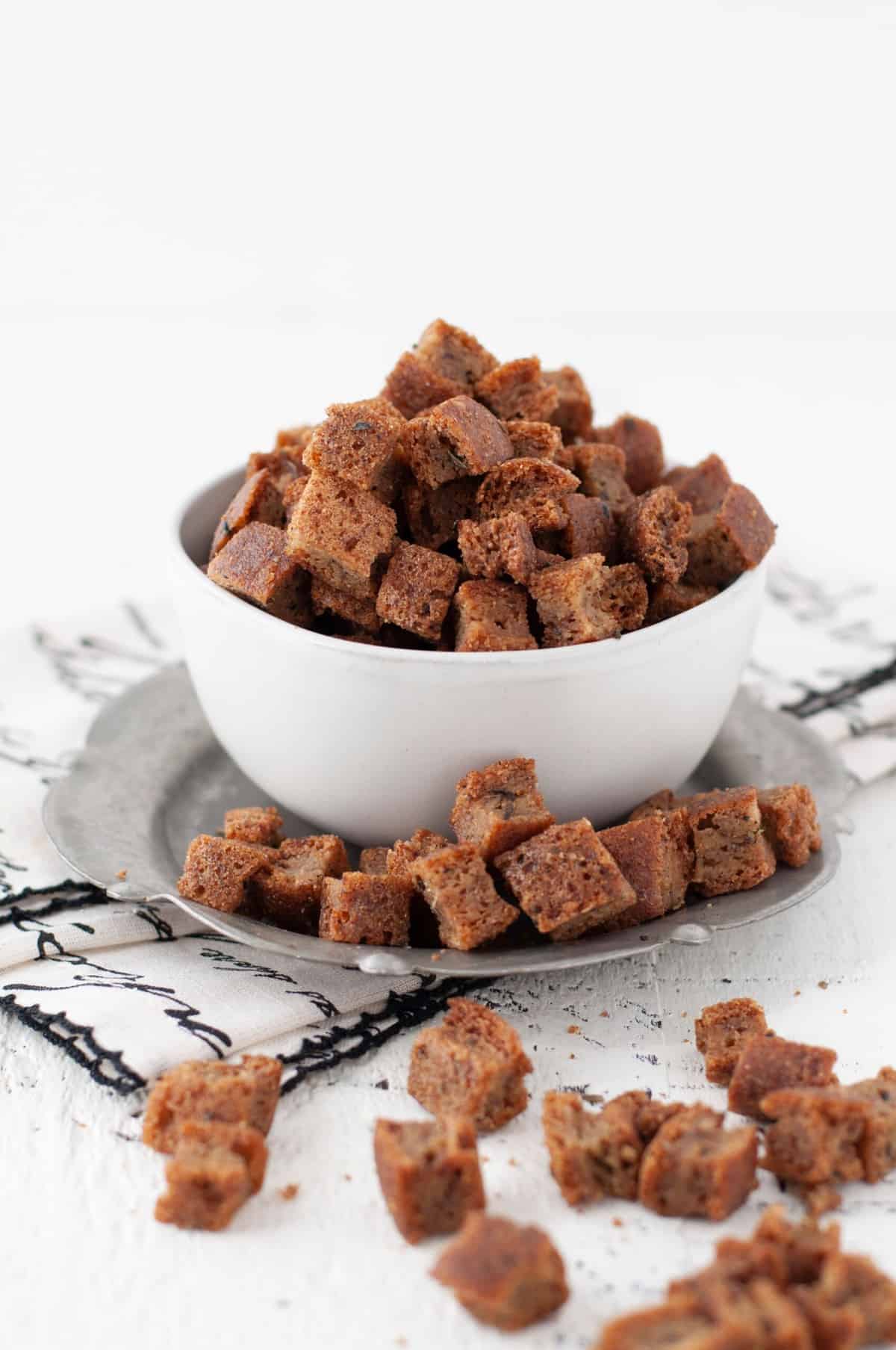 a bowl of gluten free, low carb croutons in a white bowl
