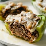 green bell peppers stuffed with roast beef, provolone cheese, mushrooms, onions, and garlic.