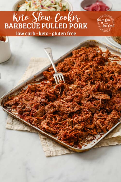 cooked and shredded pork butt, tossed with keto barbecue sauce, on a sheet pan