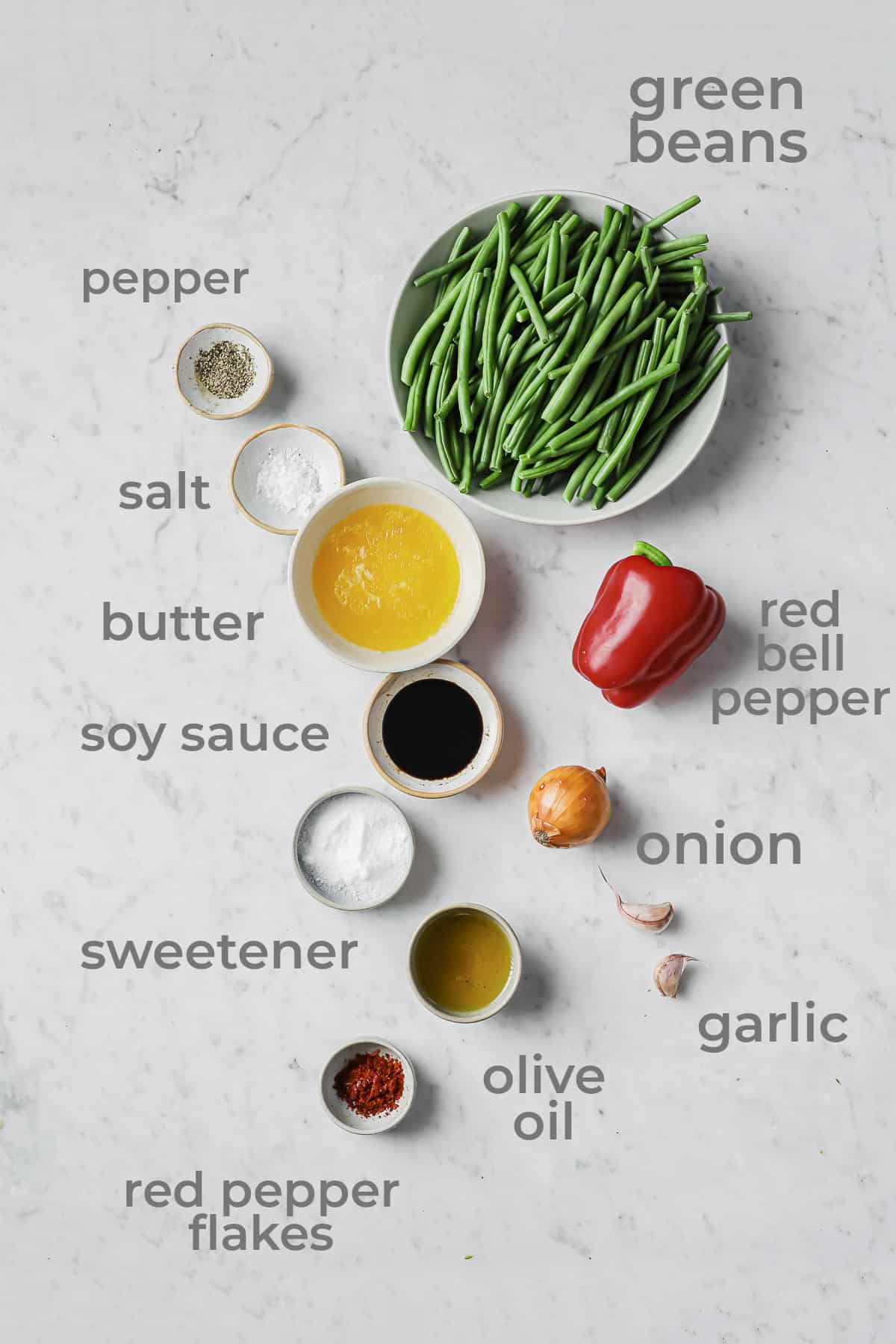 ingredients for asian green beans - green beans, peppers, onions, garlic, soy sauce, butter, and brown sugar