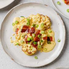 Roasted Cauliflower Steaks with Cheese Sauce