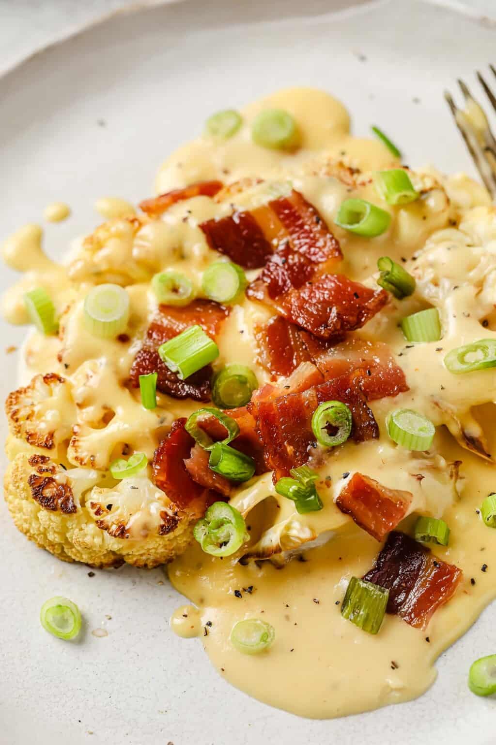 Roasted Cauliflower Steaks with Cheese Sauce Peace Love and Low Carb