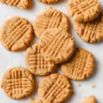 a pile of gluten free and sugar free peanut butter cookies