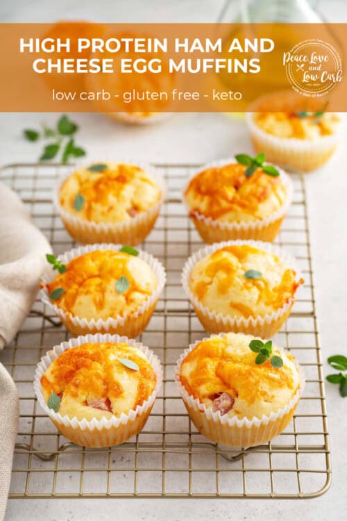 Ham and Cheese Egg muffins, garnished with fresh herbs, cooling on a wire rack.