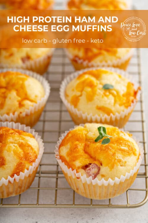 Ham and Cheese Egg muffins, garnished with fresh herbs, cooling on a wire rack.